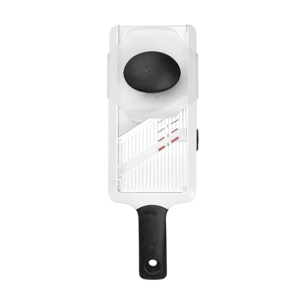 Hand-held mandoline slicer