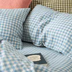 Image showing the Gingham Pair of Super King Linen Pillowcases, Warm Blue product.