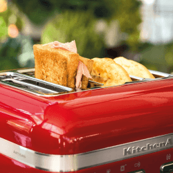 Image showing the Artisan 4 slot toaster, candy apple red product.