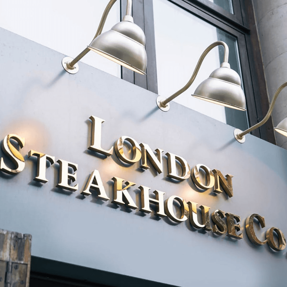 Set of Steak Knives with Apron and Three Course Dining Experience and Cocktail for Two at Marco Pierre White's London Steakhouse Co