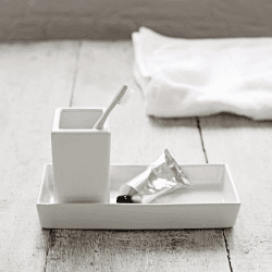 Image showing the Newcombe Toothbrush holder, H12 x W7 x L7cm, White product.