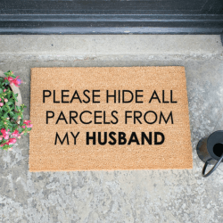 Image showing the Please Hide all Parcels From Husband Doormat, L60 x W40 x H1.5cm, Black product.